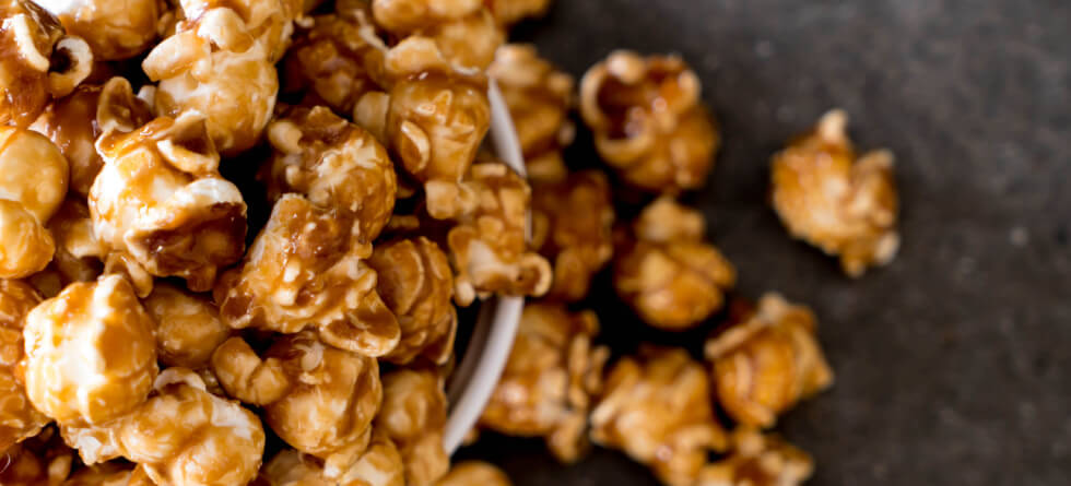How Do You Get Sugar to Stick to Popcorn?